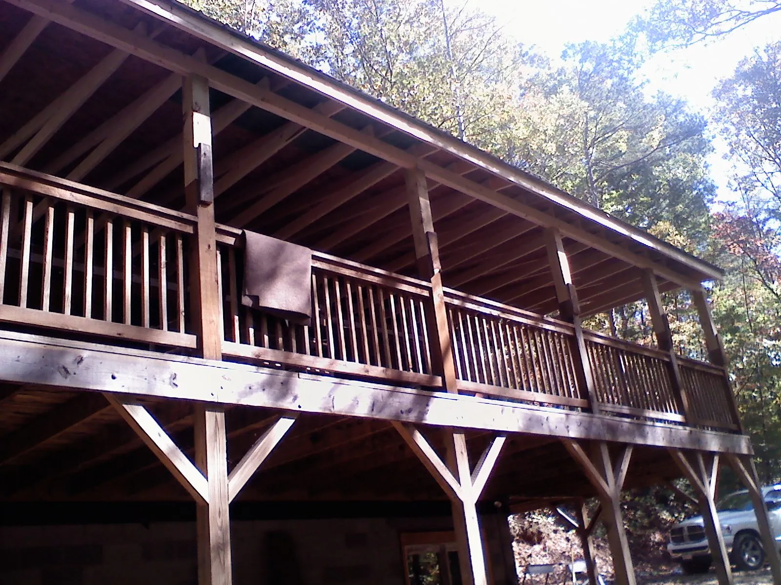 Timber framing under a new elevated porch and deck — Roof Leak Repair in Panguitch by Roofing Brothers